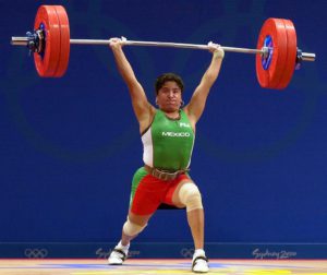 (FILE) Picture taken in Sydney 18 September 2000 of Mexican Soraya Jimenez during the women's -58kg weightlifting of the 2000 Summer Olympics. Jimenez, the first Mexican to win gold in the Olympic Games, died on March 28, 2013 at the age of 36 of a heart attack, the Mexican Olympic Committee announced. AFP PHOTO / Patrick HERTZOGPATRICK HERTZOG/AFP/Getty Images ORG XMIT:
